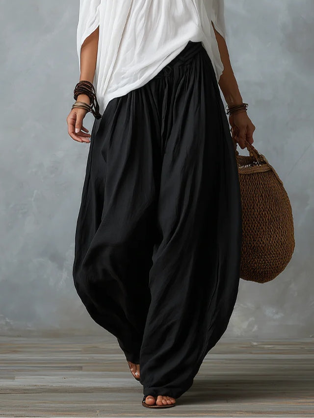 Alba | Conjunto de Top Blanco de Hombros Descubiertos y Pantalón Farol Negro