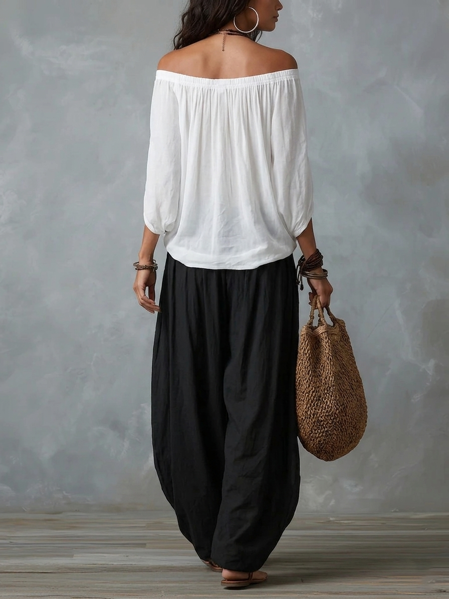 Alba | Conjunto de Top Blanco de Hombros Descubiertos y Pantalón Farol Negro