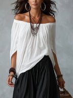 Alba | Conjunto de Top Blanco de Hombros Descubiertos y Pantalón Farol Negro