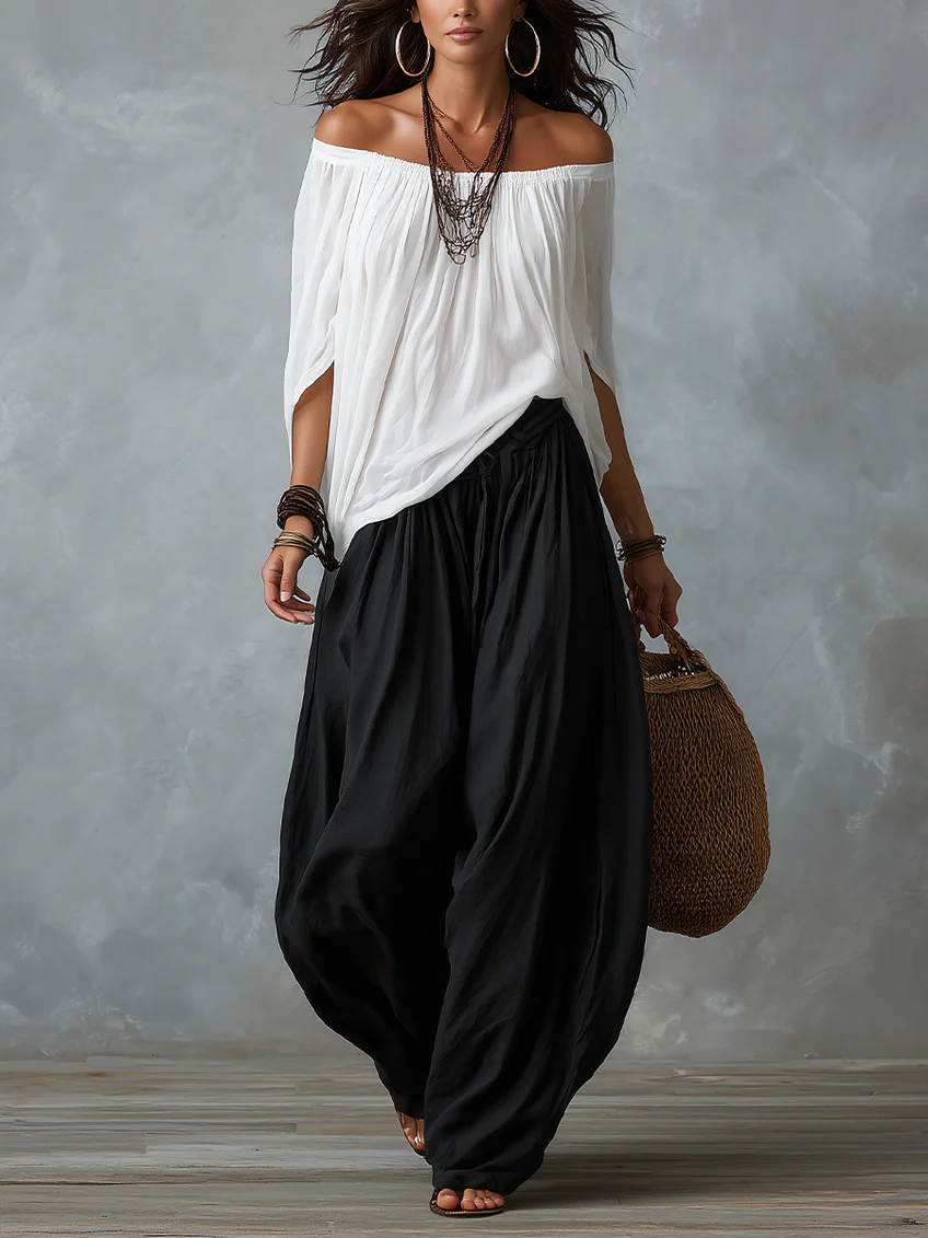 Alba | Conjunto de Top Blanco de Hombros Descubiertos y Pantalón Farol Negro